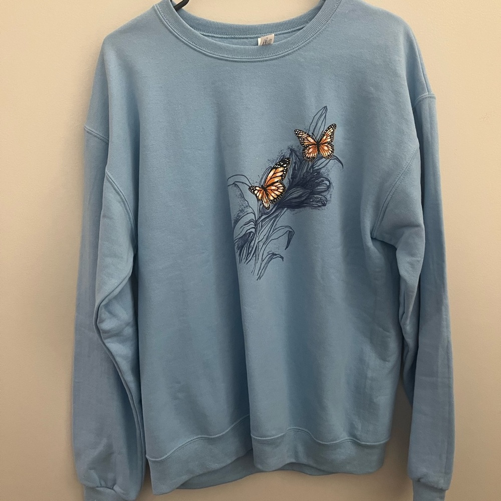 light blue women’s medium crew neck